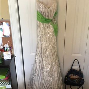 This is a show stopper dress altered down to a 00